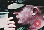 Image of medical aid via Huey helicopter and ambulance Vietnam, 1966, second 54 stock footage video 65675077440