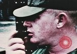 Image of medical aid via Huey helicopter and ambulance Vietnam, 1966, second 55 stock footage video 65675077440