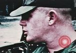 Image of medical aid via Huey helicopter and ambulance Vietnam, 1966, second 57 stock footage video 65675077440