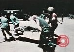 Image of medical aid via Huey helicopter and ambulance Vietnam, 1966, second 60 stock footage video 65675077440