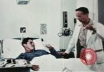 Immagine di Soldati feriti Filippine, 1966, secondo 53 filmato di repertorio 65675077445