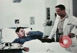 Immagine di Soldati feriti Filippine, 1966, secondo 54 filmato di repertorio 65675077445