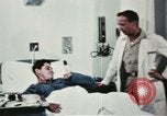Immagine di Soldati feriti Filippine, 1966, secondo 56 filmato di repertorio 65675077445