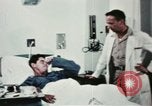 Immagine di Soldati feriti Filippine, 1966, secondo 57 filmato di repertorio 65675077445