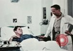 Immagine di Soldati feriti Filippine, 1966, secondo 59 filmato di repertorio 65675077445