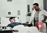 Immagine di Soldati feriti Filippine, 1966, secondo 61 filmato di repertorio 65675077445