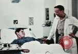 Immagine di Soldati feriti Filippine, 1966, secondo 62 filmato di repertorio 65675077445