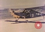 Image of L-5 aircraft Okinawa Ryukyu Islands, 1945, second 41 stock footage video 65675077471