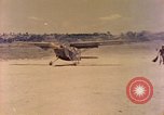 Image of L-5 aircraft Okinawa Ryukyu Islands, 1945, second 59 stock footage video 65675077471