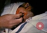 Image of wounded Marine Iwo Jima, 1945, second 30 stock footage video 65675077473