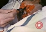 Image of wounded Marine Iwo Jima, 1945, second 39 stock footage video 65675077473