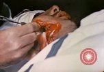 Image of wounded Marine Iwo Jima, 1945, second 47 stock footage video 65675077473