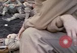 Image of wounded Marine Iwo Jima, 1945, second 13 stock footage video 65675077474