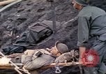 Image of wounded Marine Iwo Jima, 1945, second 15 stock footage video 65675077474