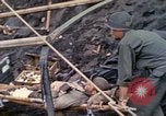 Image of wounded Marine Iwo Jima, 1945, second 16 stock footage video 65675077474