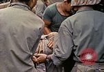 Image of wounded Marine Iwo Jima, 1945, second 38 stock footage video 65675077474