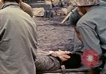 Image of wounded Marine Iwo Jima, 1945, second 40 stock footage video 65675077474