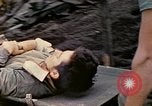 Image of wounded Marine Iwo Jima, 1945, second 44 stock footage video 65675077474
