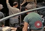 Image of wounded Marine Iwo Jima, 1945, second 46 stock footage video 65675077474