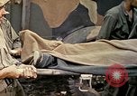 Image of wounded Marine Iwo Jima, 1945, second 55 stock footage video 65675077474