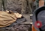 Image of wounded Marine Iwo Jima, 1945, second 62 stock footage video 65675077474