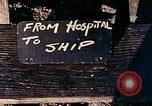 Image of Okinawa wounded evacuated Okinawa Ryukyu Islands, 1945, second 4 stock footage video 65675077506