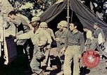 Image of Okinawa wounded evacuated Okinawa Ryukyu Islands, 1945, second 57 stock footage video 65675077506