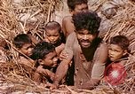 Image of natives Eniwetok Atoll Marshall Islands, 1944, second 9 stock footage video 65675077521