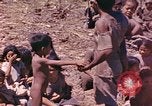 Image of natives Eniwetok Atoll Marshall Islands, 1944, second 13 stock footage video 65675077521
