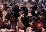 Image of natives Eniwetok Atoll Marshall Islands, 1944, second 26 stock footage video 65675077521
