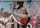 Image of dead soldiers Eniwetok Atoll Marshall Islands, 1944, second 1 stock footage video 65675077522