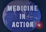 Image of wounded Marines Saipan Northern Mariana Islands, 1944, second 21 stock footage video 65675077536