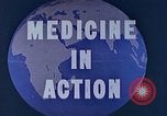 Image of wounded Marines Saipan Northern Mariana Islands, 1944, second 22 stock footage video 65675077536