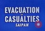 Image of wounded Marines Saipan Northern Mariana Islands, 1944, second 30 stock footage video 65675077536