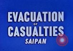 Image of wounded Marines Saipan Northern Mariana Islands, 1944, second 31 stock footage video 65675077536