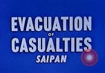 Image of wounded Marines Saipan Northern Mariana Islands, 1944, second 34 stock footage video 65675077536