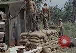 Image of wounded Marines Saipan Northern Mariana Islands, 1945, second 19 stock footage video 65675077539