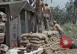 Image of wounded Marines Saipan Northern Mariana Islands, 1945, second 20 stock footage video 65675077539