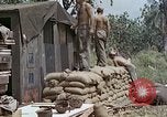 Image of wounded Marines Saipan Northern Mariana Islands, 1945, second 21 stock footage video 65675077539