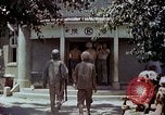 Image of wounded Marines Saipan Northern Mariana Islands, 1945, second 56 stock footage video 65675077539