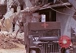 Image of wounded Marines Saipan Northern Mariana Islands, 1945, second 4 stock footage video 65675077540