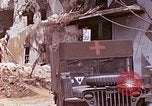 Image of wounded Marines Saipan Northern Mariana Islands, 1945, second 5 stock footage video 65675077540