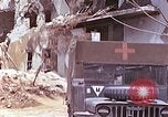 Image of wounded Marines Saipan Northern Mariana Islands, 1945, second 6 stock footage video 65675077540