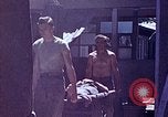 Image of wounded Marines Saipan Northern Mariana Islands, 1945, second 15 stock footage video 65675077540