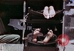 Image of wounded Marines Saipan Northern Mariana Islands, 1945, second 21 stock footage video 65675077540