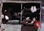 Image of wounded Marines Saipan Northern Mariana Islands, 1945, second 23 stock footage video 65675077540