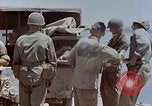 Image of wounded Marines Saipan Northern Mariana Islands, 1945, second 42 stock footage video 65675077540