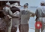 Image of wounded Marines Saipan Northern Mariana Islands, 1945, second 47 stock footage video 65675077540