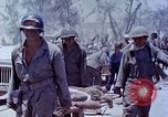 Image of wounded Marines Saipan Northern Mariana Islands, 1945, second 51 stock footage video 65675077540