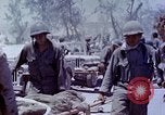 Image of wounded Marines Saipan Northern Mariana Islands, 1945, second 52 stock footage video 65675077540